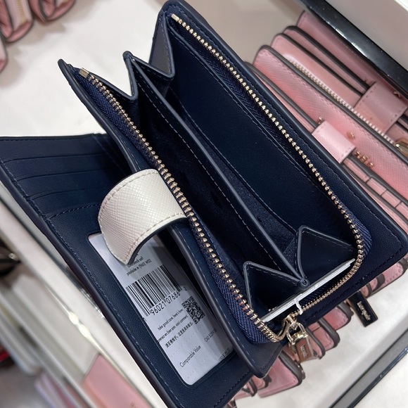 Kate Spade staci medium compact bifold wallet
POOLSIDE MULTI - Picture 8 of 16